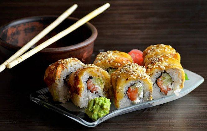 Sushi is traditionally eaten with the fingers, although many people use chopsticks.