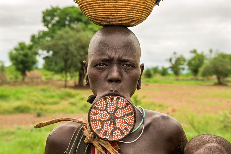 Wearing a large disc in the lower lip is considered beautiful in some parts of Ethiopia.